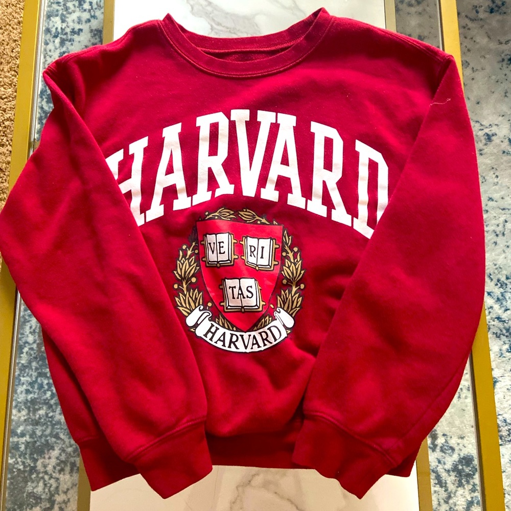 AWAKE, red Harvard sweatshirt.